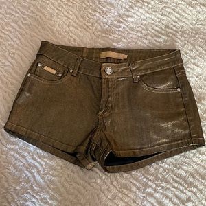 Gold short shorts w a little bit of bling